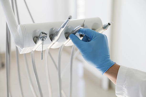 Professional Tooth Extraction technician working in Malvern, AR